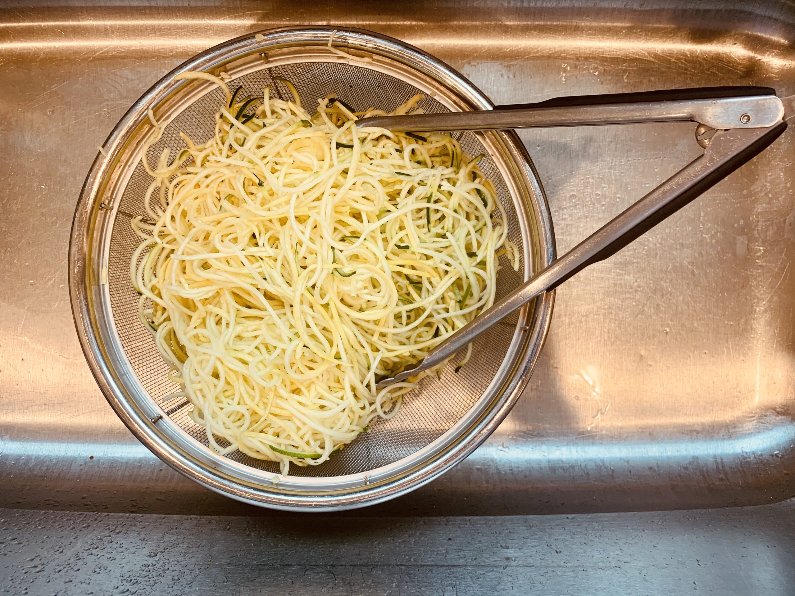 Companion Health's Zucchini Noodles or Zoodles in Colander