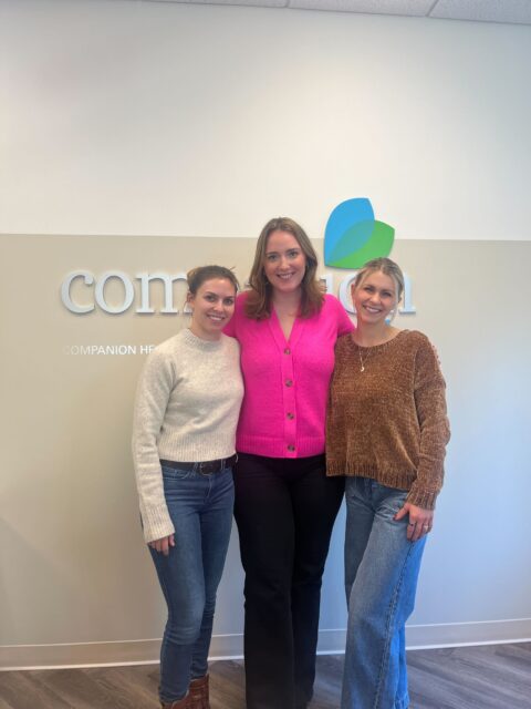 Casey's functional medicine journey: a photo of Casey with her provider, Anya Wallace, and her health coach Stevie